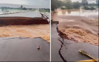 Rodovia tem parte do asfalto destruída após alagamento, em Iaciara — Foto: Divulgação/Bombeiros